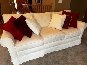 lot 5 image: Cream Colored Upholstered Couch Measuring 72W x 34D x 32H. Custom Made Exclusively For Sofas And Chairs In Excellent Condition Smoke-Free Home. Matching Loveseat Available In Auction