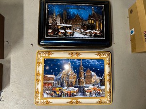 lot 250 image: Set Of Two Chris Kindle Market Tins.