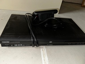 lot 253 image: Toshiba DVD Player And Digital Alarm Clock.