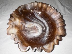 lot 112 image: Imperial Caramel Slag Glass Windmill Measuring 8 Inches Diameter