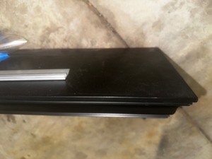 lot 129 image: Black Decorative Wood Shelf Measuring 36 X 10