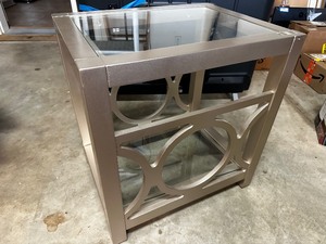 lot 141 image: End Table Measuring 23 X 17 X 23 Painted Metallic Look And Glass
