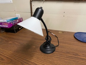 lot 234 image: Black Metal Desk Lamp With Bendable Neck And White Plastic Shade. Approximately 18 12 Inches Tall Fully Extended. Base 6 Inches In Diameter.