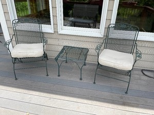 lot 75 image: Set Of Two Metal Patio Chairs With Cushions And Table. Chairs Measure 37 Inches High By 26 Inches Wide By 25 Inches Deep. Table Measures 19 12 Inches Deep By 20 Inches Wide