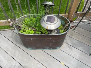 lot 81 image: Metal Planting Bin With Handles (One Handle Missing), Measuring 24 Inches Wide, 13 Inches Deep. Includes Miscellaneous Solar Lighting Fixtures