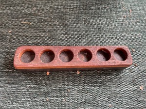 lot 90 image: Vintage Wooden Organizer With Six Holes. Measuring 14 Inches Long, 2 12 Inches Wide, And 2 Inches High
