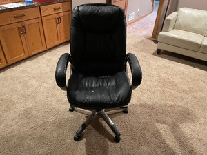 lot 201 image: Black Faux Leather Desk Chair Measuring 43 Inches Tall By 25 Inches Deep By 27 Inches Wide