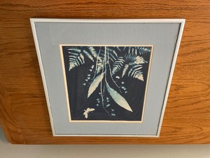 lot 215 image: Floral Framed Print. Dark Blue Background. Frame Measuring 12 Inches Wide By 12 Inches High. Lily-Of-The-Valley Flower And Butterfly With Ferns.