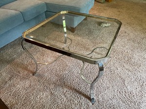 lot 228 image: Glass Topped Chrome Plated Coffee Table Measuring 31 Inches Square And 21 12 Inches Tall.