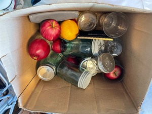 lot 317 image: Box Of Antique Blue Ball Canning Jars, Miscellaneous Glasses, And Faux Fruit