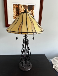 lot 16 image: Two Light Tiffany Style Stained Glass Table Bedside Pull Chain Lamp with Retro Nostalgia Metal Leaf Design Base Appx 18 Tall