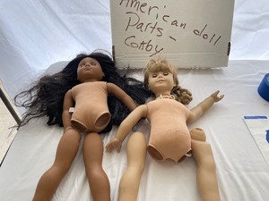 Two American Girl Doll Parts.