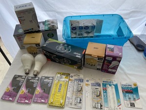 Pin of Various Size Lightbulbs and Partially Full Boxes.