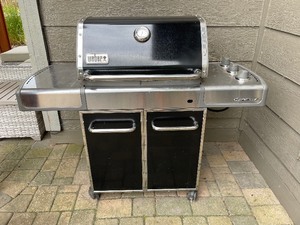 Weber Genesis Grill Three Burner Stainless Steel, Cast-Iron Grates, Propane Tank, Grilling Tool and Cover. Dimensions 58 Inches Wide 26 Inches Deep 48 Inches Tall. Grilling Surface 19 Inches x 24 Inches.