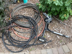 3 Heavy Duty Garden Hoses and BIG Sprinkler 1000F on Wheels.