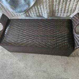 Woven Bench measuring 42 inches wide by 17 inches deep and 17 inches tall with top lid lift for storage