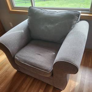 Graphite gray Pottery Barn chair in Heather tweed measuring 44 inches wide by 40 inches deep by 32 inches tall