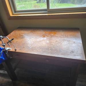 Vintage library desk measuring 42 inches wide by 26 inches deep by 29 inches tall, contents not included