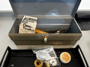 Vintage metal toolbox with electric flush stapler