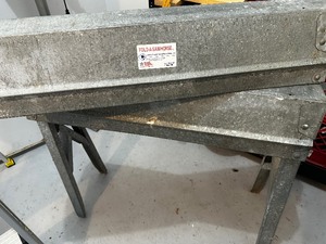 Folding metal fold-a-sawhorse