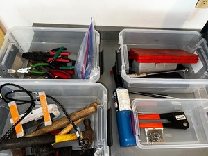 Four bins of everyday house tools