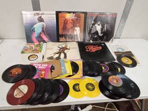 lot 56 image: 45s records and motion picture sound track 33s
