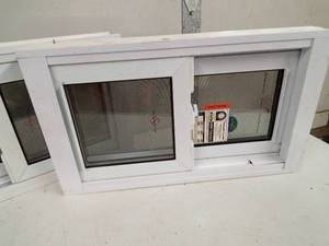 lot 44 image: Pair of new slider windows