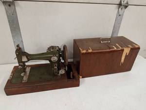 lot 27 image: Western Electric sewing machine in case