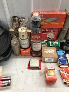 lot 288 image: Auto Filters, Bike Tubes, Carburetor, 3 Oil Pans and More