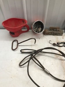 lot 289 image: Metal Brushes, Ball Hitch, Hay Bale Pick, Screws, LP Gas Regulator, Seeder, Metal Tow Cable & More