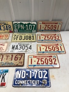lot 306 image: Lot of Collectible License Plates & More