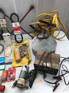 lot 341 image: Jumper Cables, Battery Tester 6v & 12v, tire wrench, trouble light, tank heater, funnels, auto parts and more