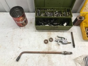lot 393 image: Brake Shoe Hold Down Parts - Grease Fittings - Certs - Wire Cleaner - Lubricant - Air Gun - Bushing Drivers - Welding Tip for Cutting