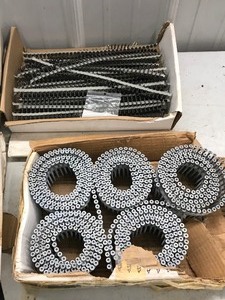 lot 398 image: 1000 Wood Screws - 8x2.5 Coil for Stanley Bostitch (3 boxes) - 6x1.25 coarse drywall strips (3 boxes) - Partial Box of Framing Nails 3.25