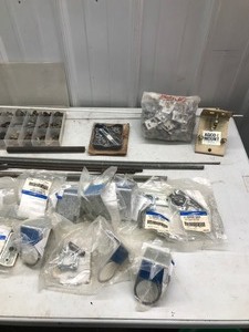 lot 424 image: Fence caps, mounting brackets, threaded rods, nuts, bolts, washers and more