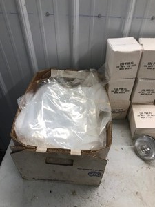 lot 425 image: Paper rolls for register, commercial filters, plastic bags and 10 flood lights