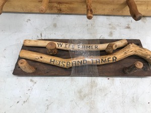 lot 513 image: 2 Wooden coat racks and wifehusband Tamer