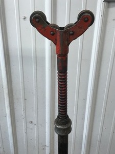 lot 553 image: Rigid adjustable roller pipe stand