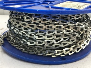 lot 574 image: Spool of chain-spool holds 100ft #35 sash zinc working load limit 126lbs