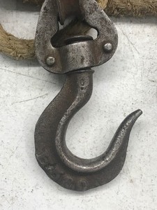 lot 618 image: Vintage pulleys with rope