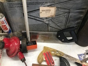lot 650 image: Folding side shelf in box, ultimate wrench organizer in pkg, level, pulley wheels, clamps, measuring wheel and more