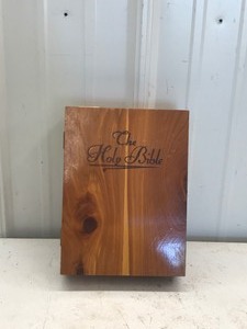 lot 665 image: Holy bible with wood box and Jesuss picture inside