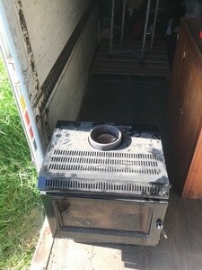 lot 677 image: Meridan 3 Merlin heating wood stove
