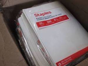 lot 56 image: Box of Cream Colored Staples 8.5x11...