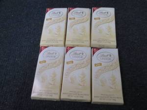 lot 312 image: 6- 3.5 oz Lindor White Chocolate Tr...