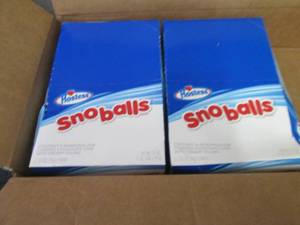 lot 394 image: 2- 21 oz Hostess Snoballs...