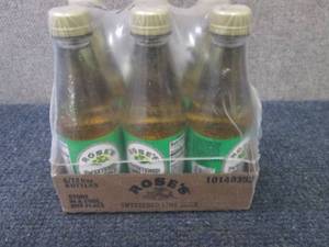 lot 399 image: 6- 12 oz Roses Sweetened Lime Juic...