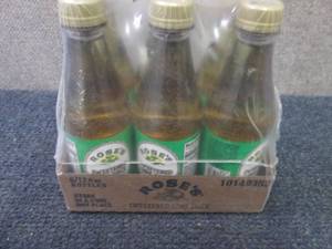 lot 400 image: 6- 12 oz Roses Sweetened Lime Juic...