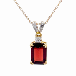 Garnet and Diamond Pendant on an 18 Necklace in Yellow Gold $999 Retail