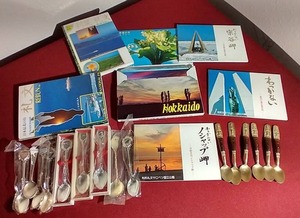 lot 47 image: Huge Lot of Asian Souvenir Postcard Books & Spoons